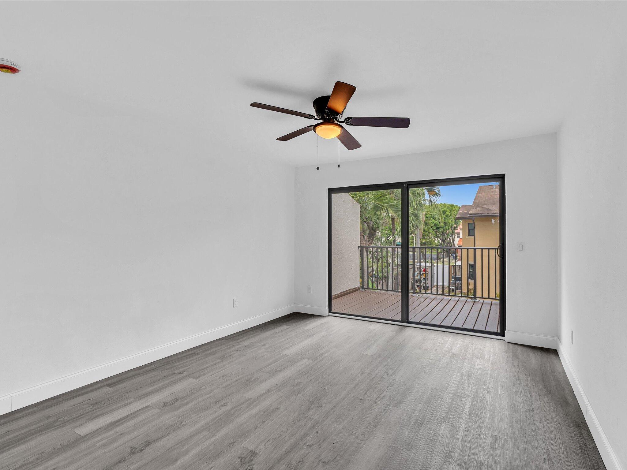 3841 Farragut Street Hollywood, FL 33021 - Photo 17 of 47 wooden floor in an empty room with a window