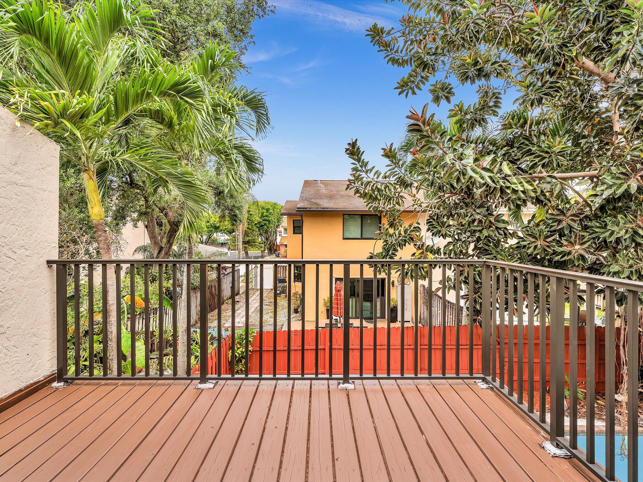 3841 Farragut Street Hollywood, FL 33021 - Photo 18 of 47 a view of a wooden roof deck