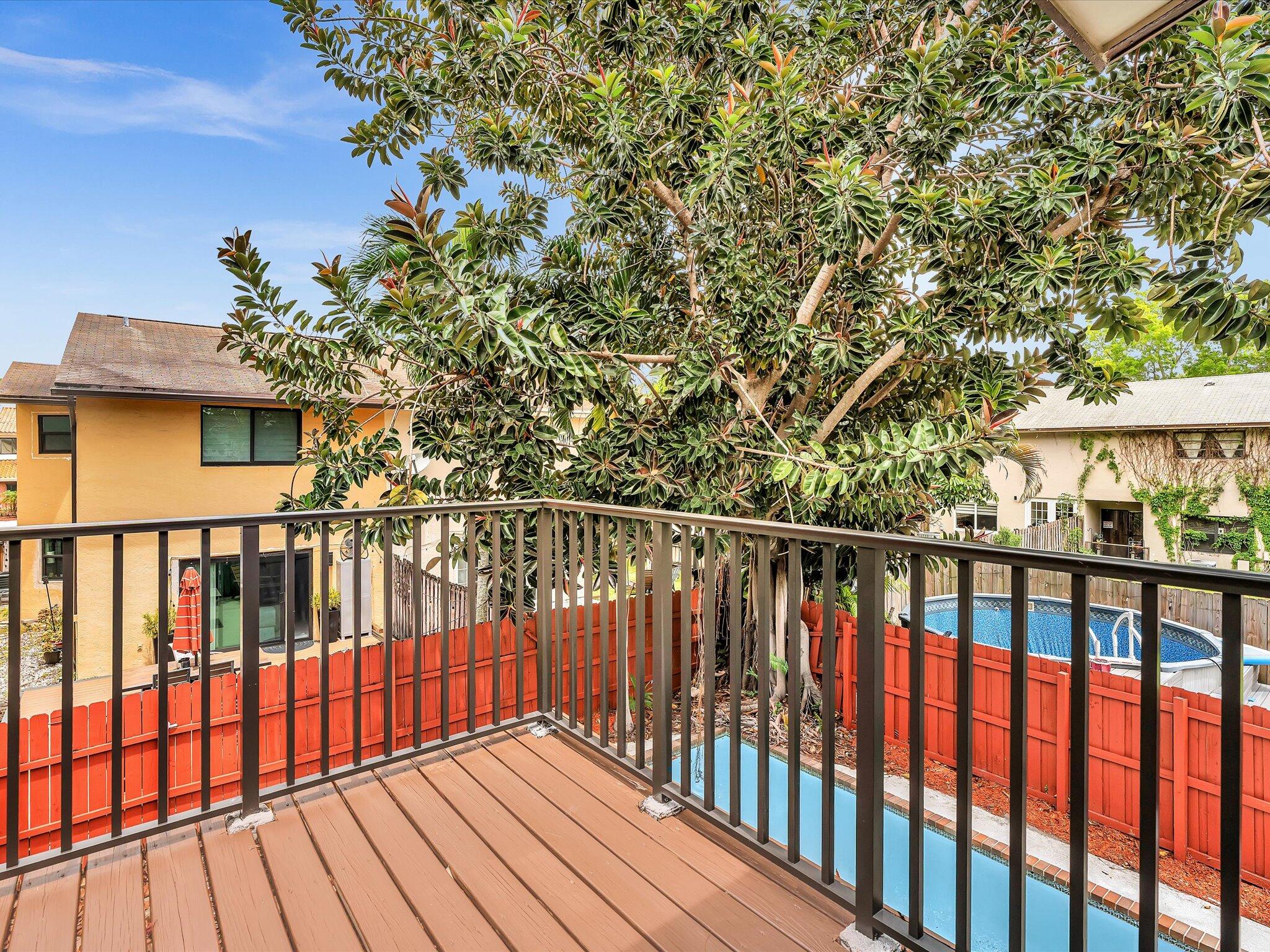 3841 Farragut Street Hollywood, FL 33021 - Photo 19 of 47 a view of balcony with wooden floor