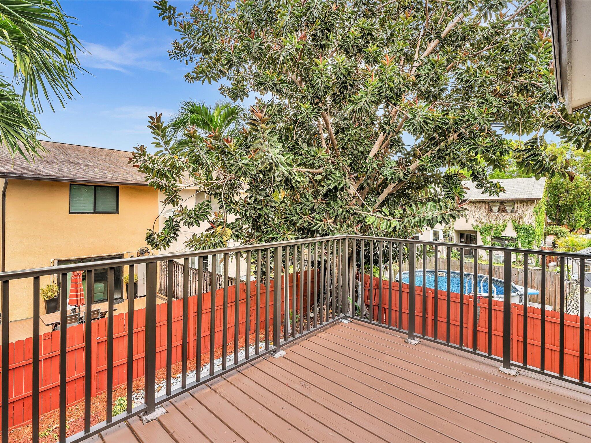 3841 Farragut Street Hollywood, FL 33021 - Photo 20 of 47 a view of wooden balcony with a pot