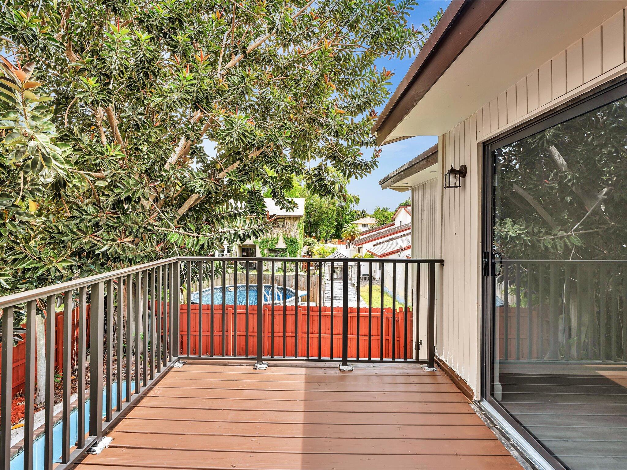 3841 Farragut Street Hollywood, FL 33021 - Photo 21 of 47 a view of a wooden fence