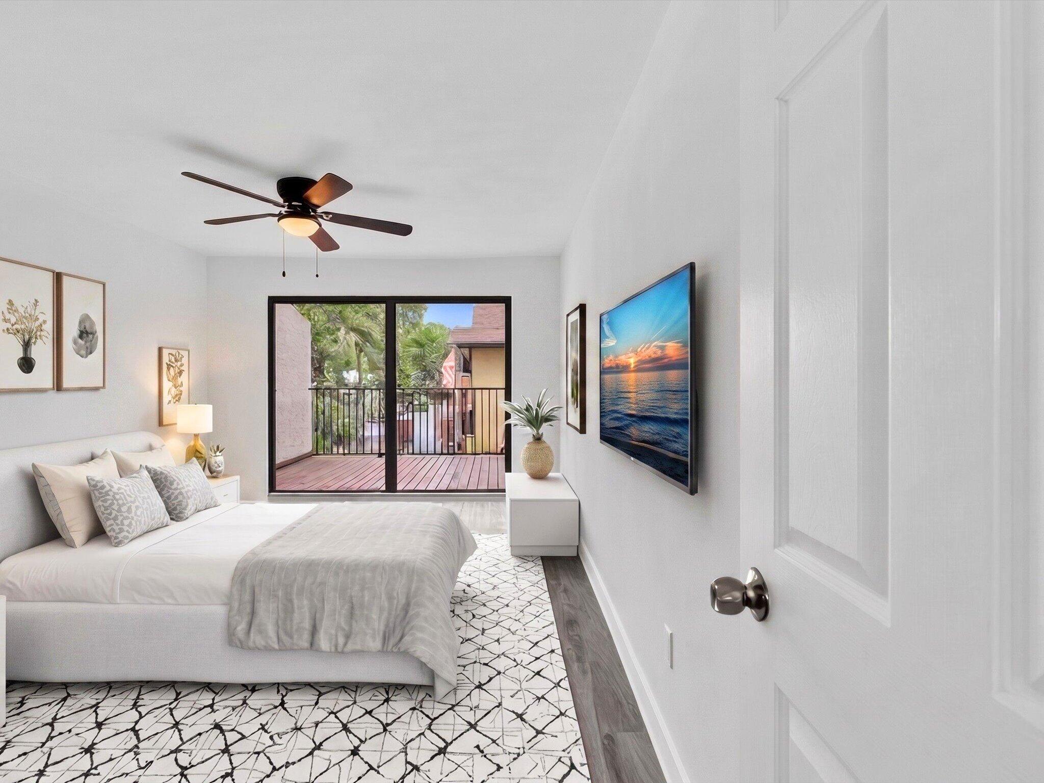 3841 Farragut Street Hollywood, FL 33021 - Photo 31 of 47 a bedroom with a bed and a flat screen tv