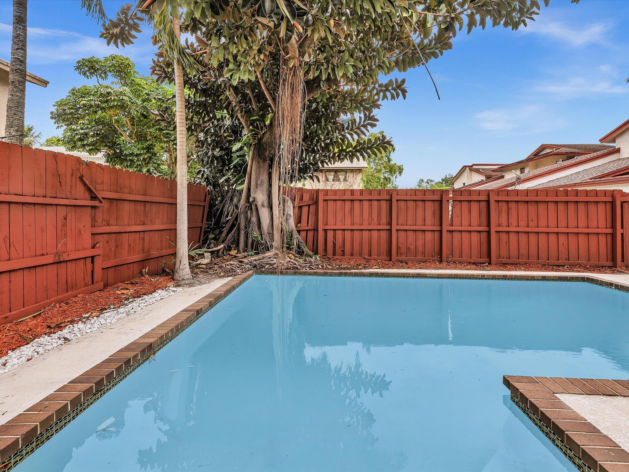 3841 Farragut Street Hollywood, FL 33021 - Photo 39 of 47 a view of a backyard with a small cabin