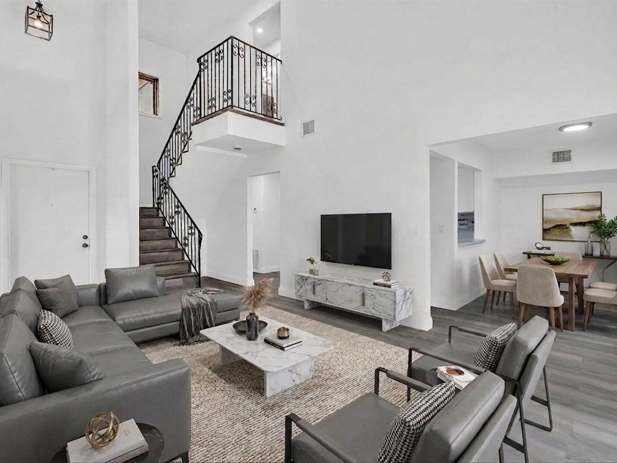 3841 Farragut Street Hollywood, FL 33021 - Photo 4 of 47 a living room with furniture a flat screen tv and a window