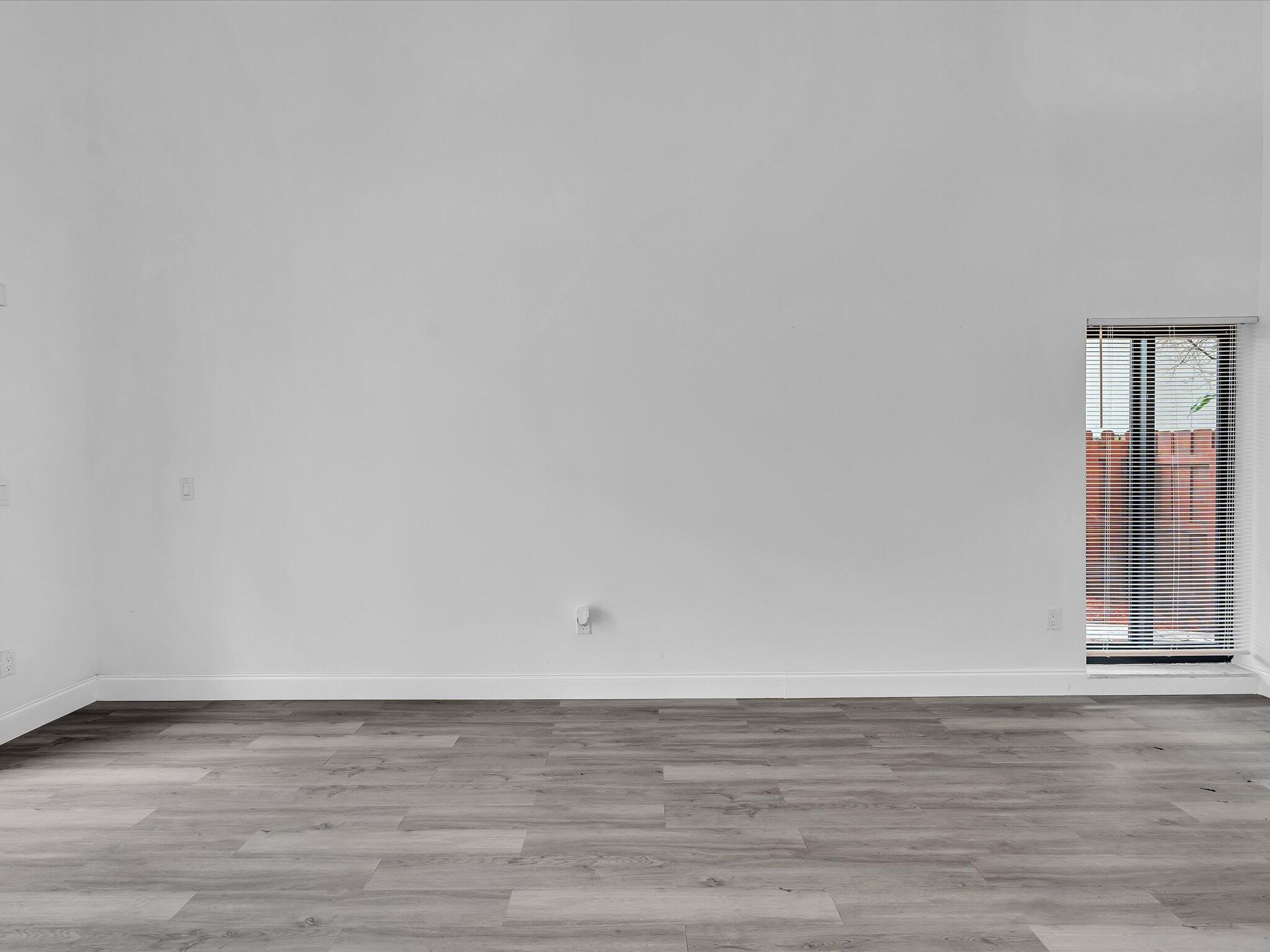 3841 Farragut Street Hollywood, FL 33021 - Photo 44 of 47 a view of an empty room and wooden floor