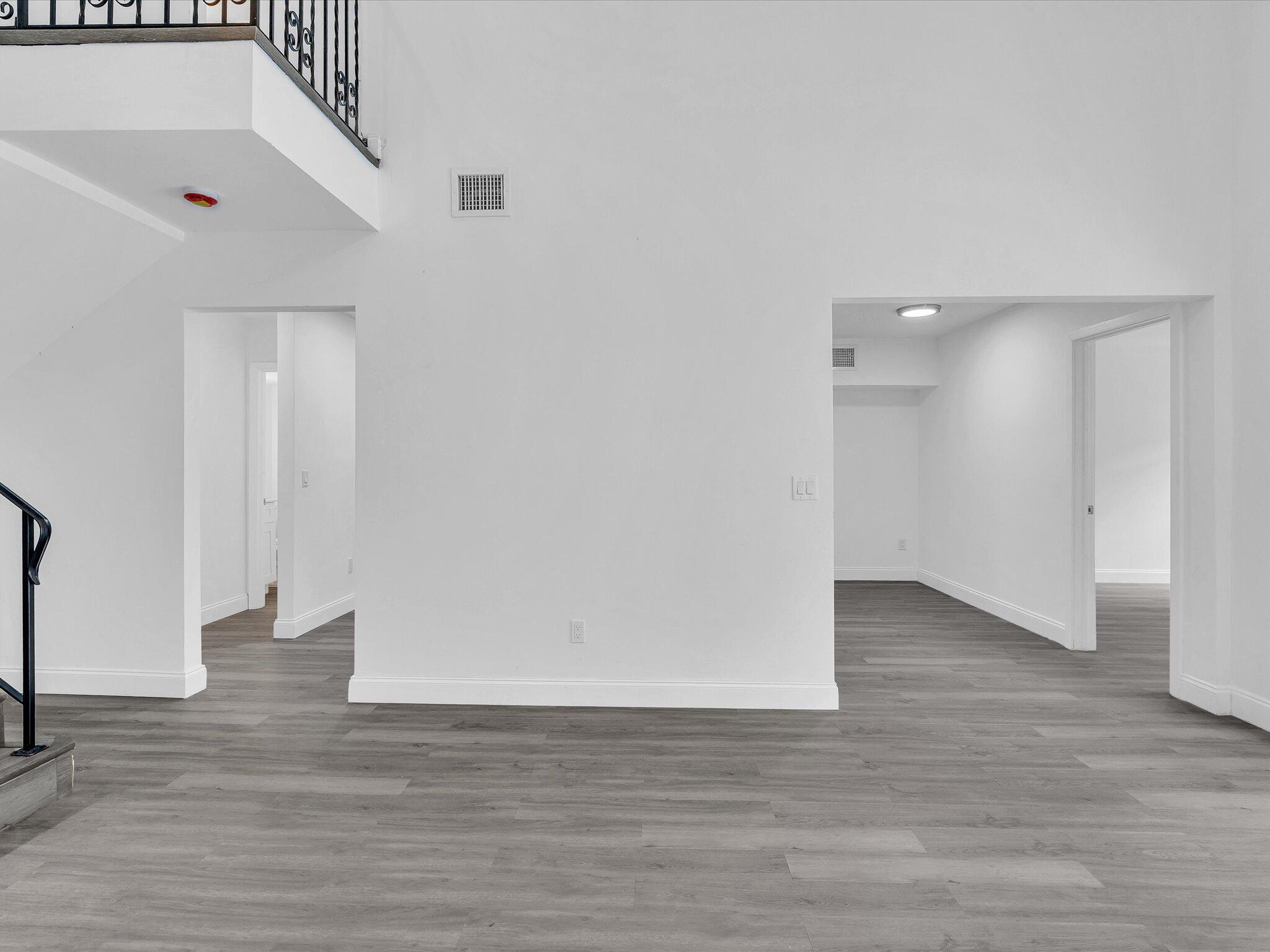 3841 Farragut Street Hollywood, FL 33021 - Photo 46 of 47 a view of an empty room with wooden floor