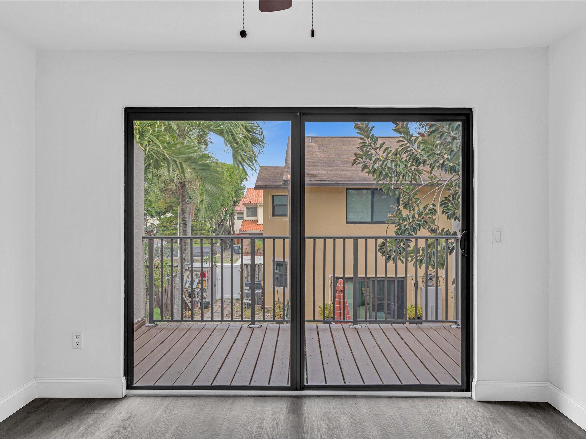 3841 Farragut Street Hollywood, FL 33021 - Photo 7 of 47 a view of a small space with wooden floor and a window