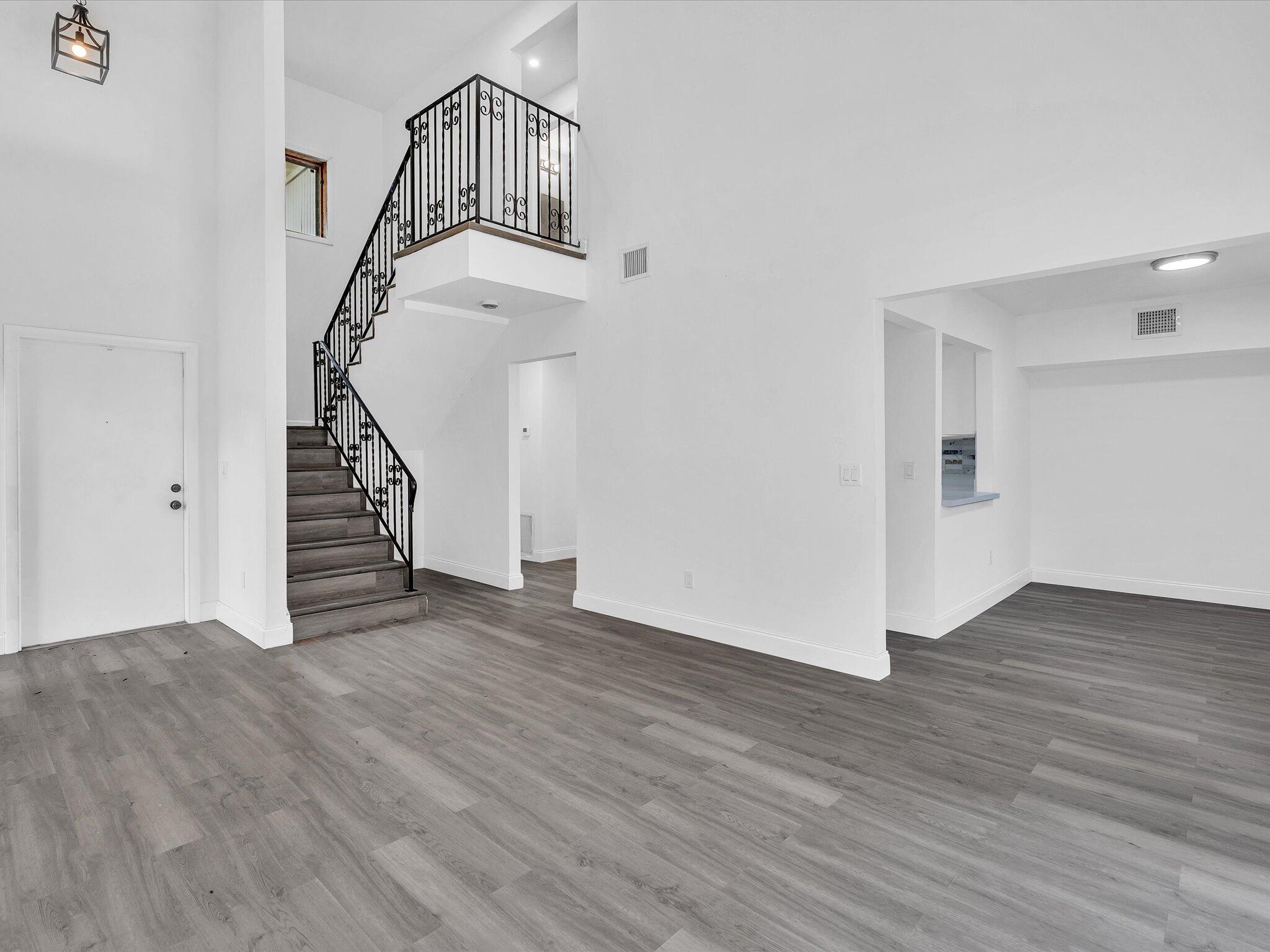 3841 Farragut Street Hollywood, FL 33021 - Photo 8 of 47 a view of an entryway with wooden floor