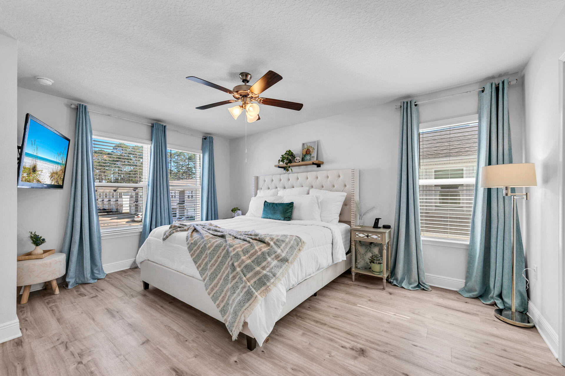 12 Sandy Cv Way, Unit LOT 104 Miramar Beach, FL 32550 - Photo 17 of 32 a bedroom with a bed and a chandelier