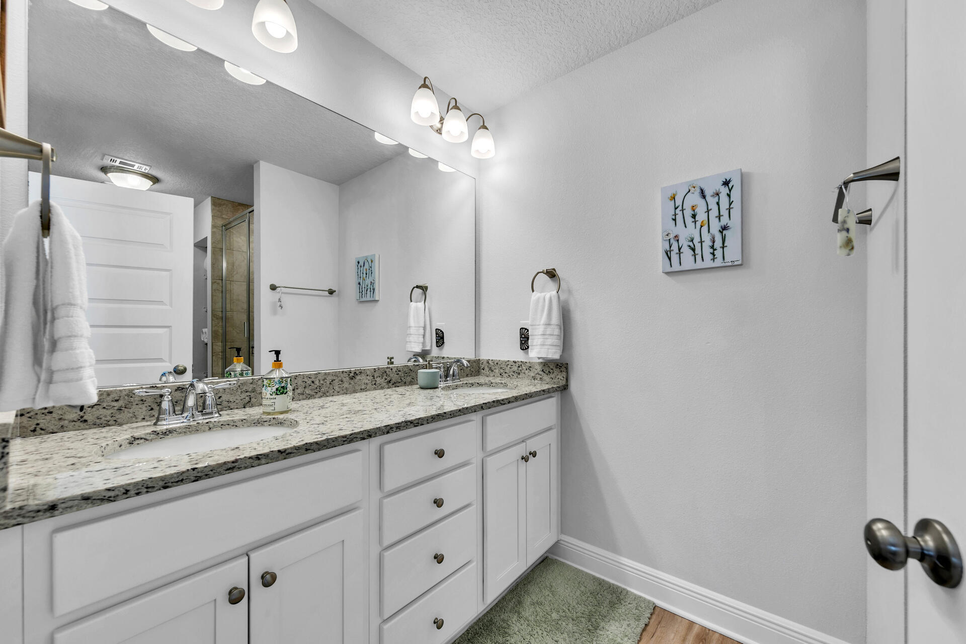 12 Sandy Cv Way, Unit LOT 104 Miramar Beach, FL 32550 - Photo 20 of 32 a bathroom with a granite countertop sink and a mirror