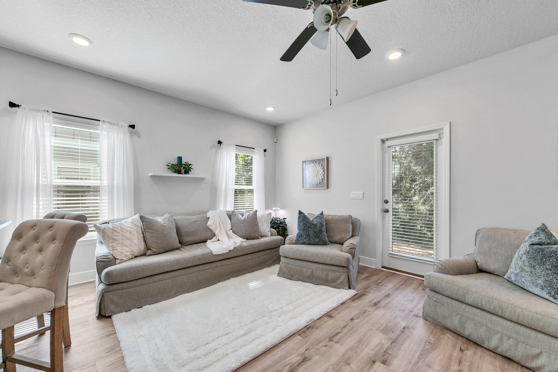 12 Sandy Cv Way, Unit LOT 104 Miramar Beach, FL 32550 - Photo 6 of 32 a living room with furniture and a large window