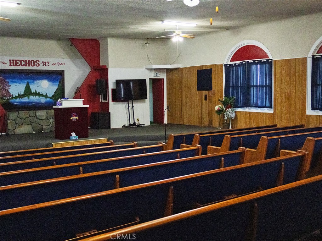 203 West 20th Street Merced, CA 95340 - Photo 5 of 10 a room with gym equipment and a large window