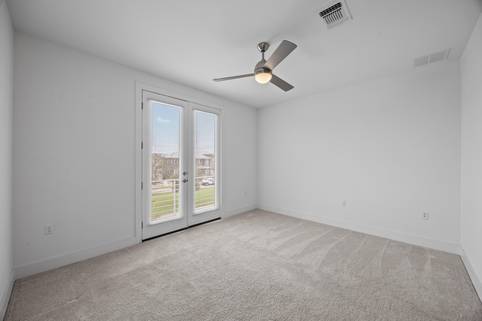 2222 Simond Avenue, Unit E Austin, TX 78723 - Photo 22 of 28 Secondary bedroom.