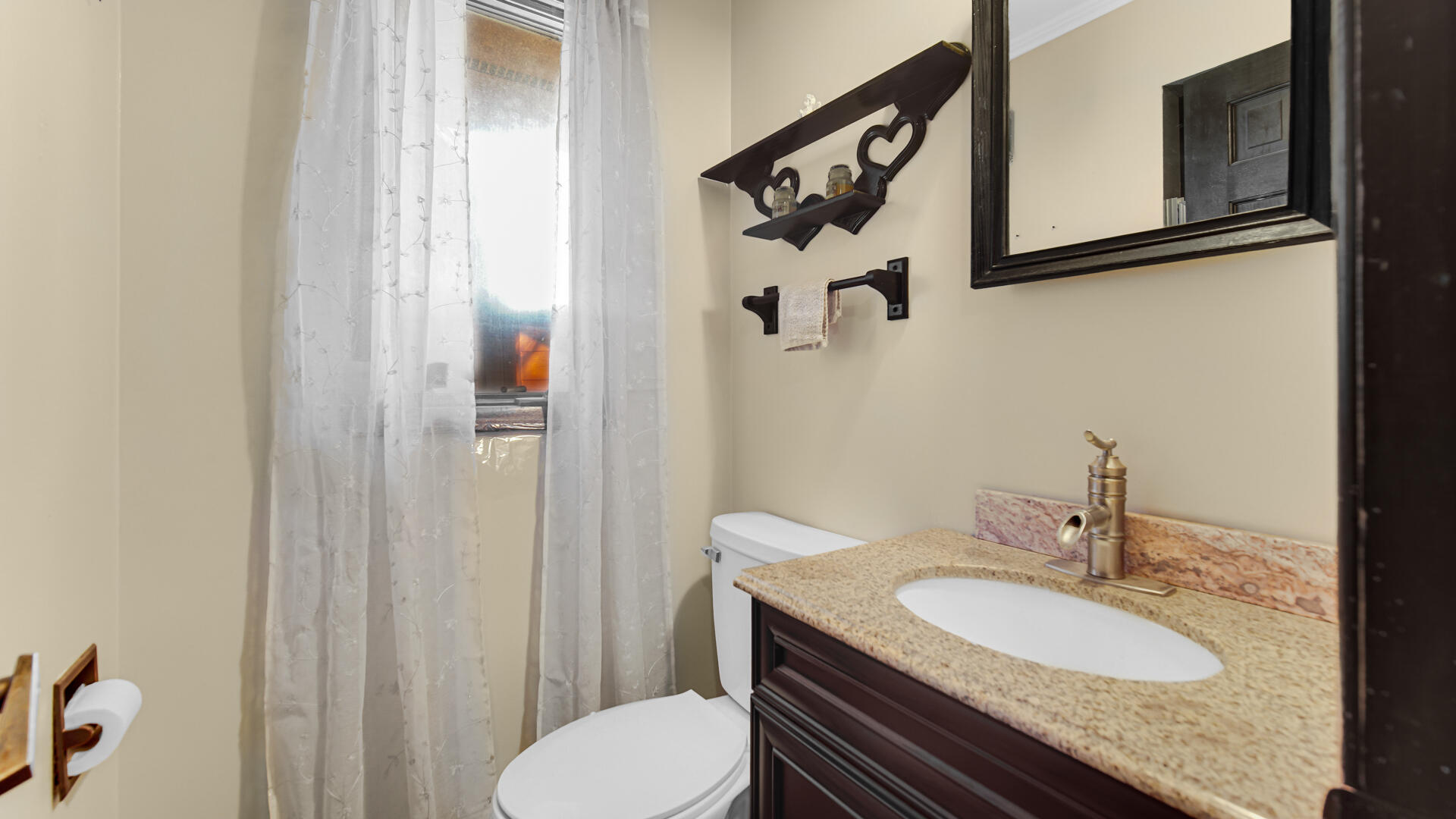 3050 East 139th Avenue Crown Point, IN 46307 - Photo 12 of 38 a bathroom with a granite countertop sink toilet and mirror