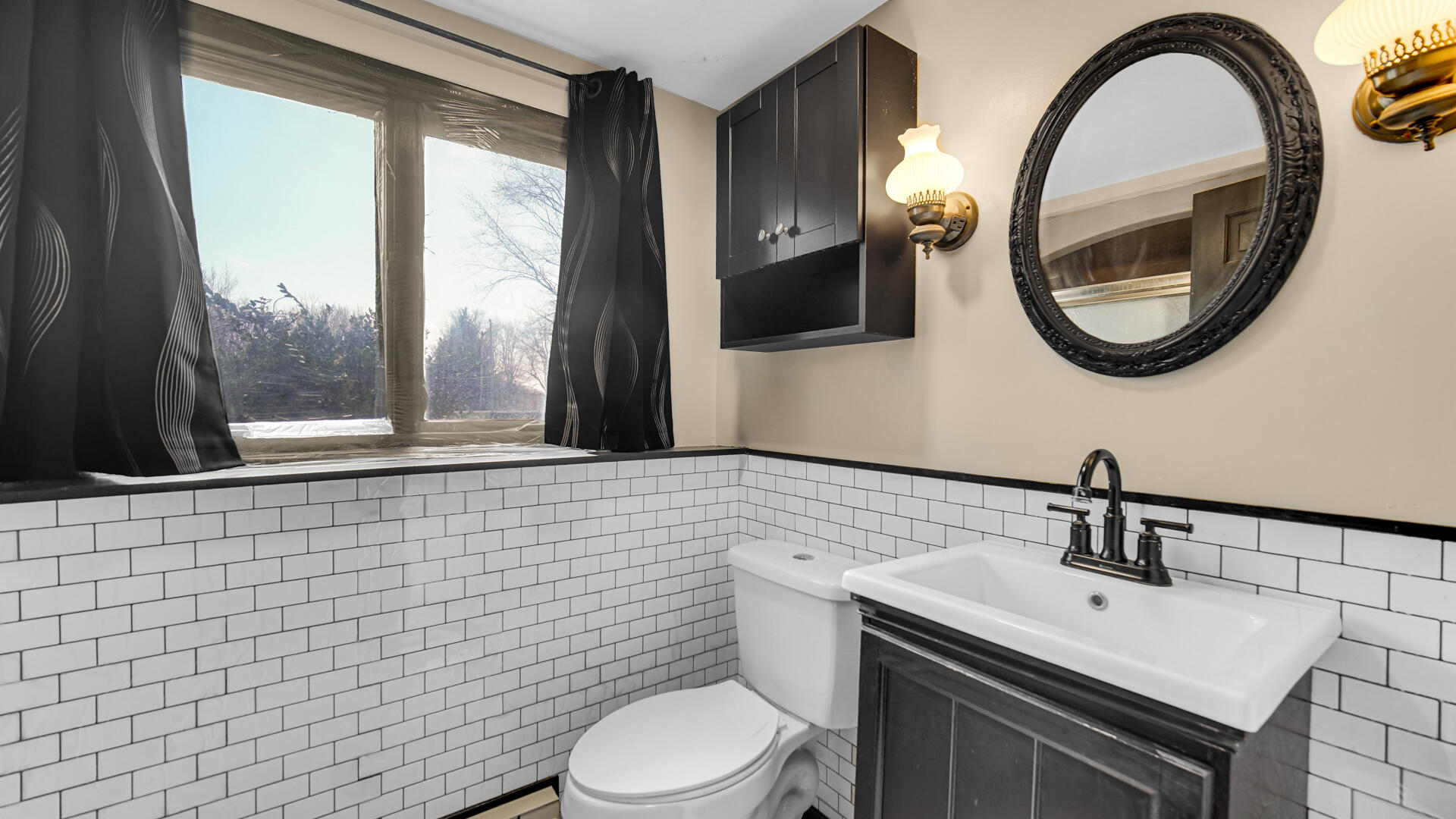 3050 East 139th Avenue Crown Point, IN 46307 - Photo 21 of 38 a bathroom with a toilet a sink and mirror