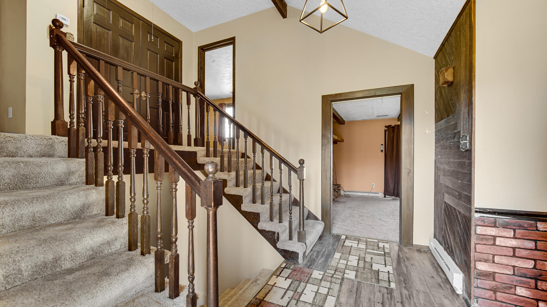 3050 East 139th Avenue Crown Point, IN 46307 - Photo 5 of 38 a view of staircase with wooden floor and staircase