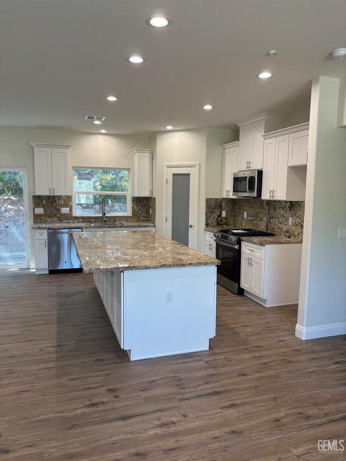 Undisclosed Address Tehachapi, CA 93561 - Photo 7 of 24 a large kitchen with stainless steel appliances lots of counter space and a sink