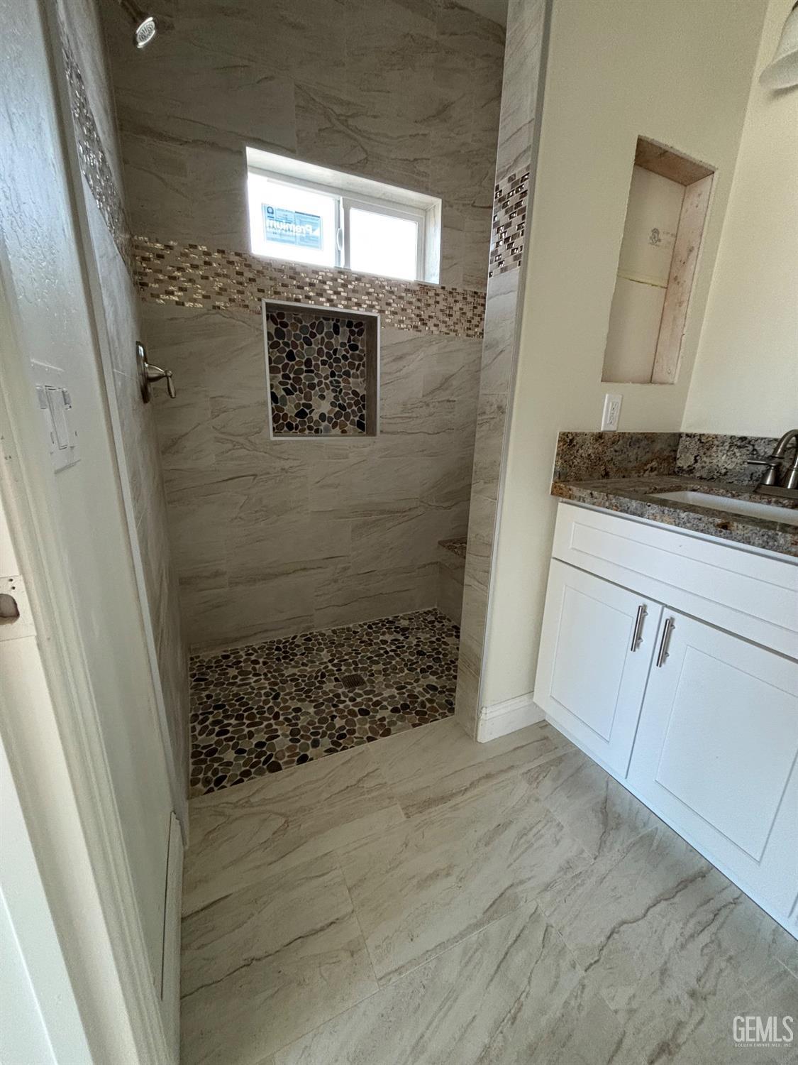 Undisclosed Address Tehachapi, CA 93561 - Photo 9 of 14 a bathroom with a sink and a mirror