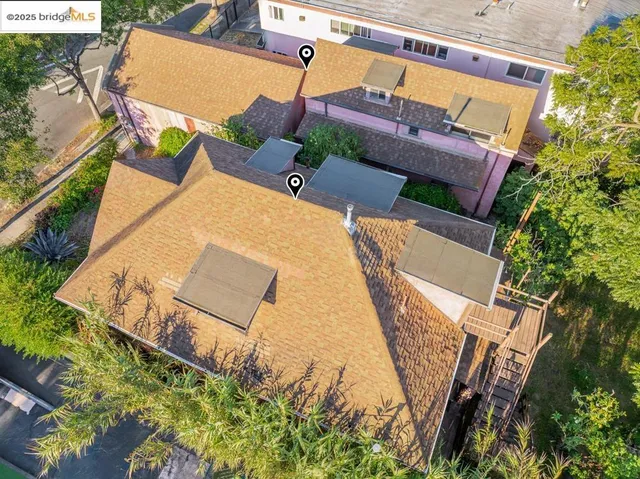an aerial view of a house with swimming pool