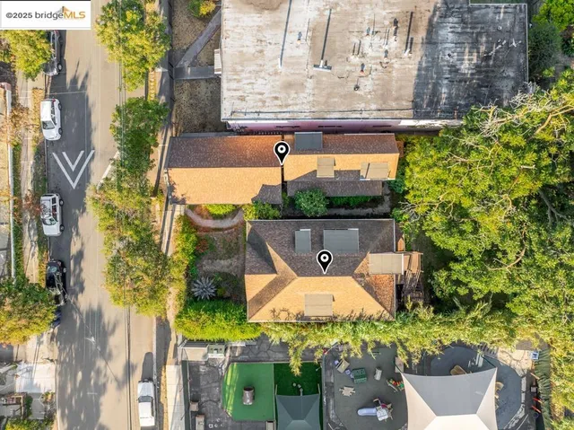 front view of a house with a fountain