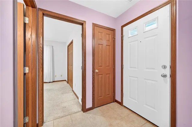 a view of a hallway with closet area