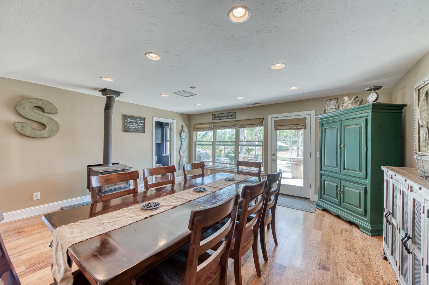 5588 North McCall Avenue Clovis, CA 93619 - Photo 24 of 77 a dining room with furniture and window