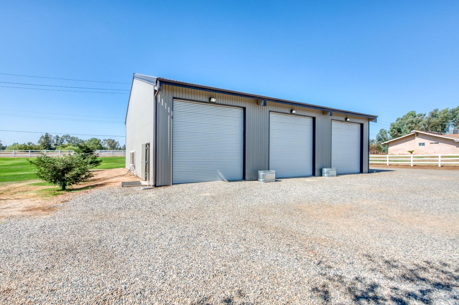 5588 North McCall Avenue Clovis, CA 93619 - Photo 57 of 77 a view of a house with a garage