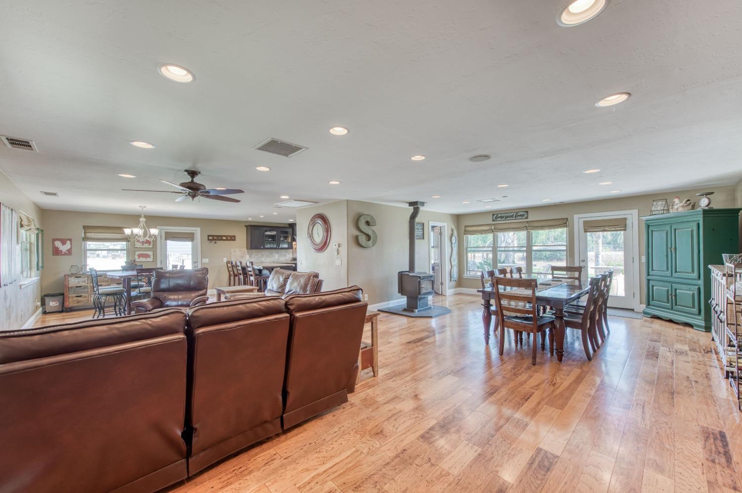 5588 North McCall Avenue Clovis, CA 93619 - Photo 9 of 77 a view of a dining room with furniture window and outside view