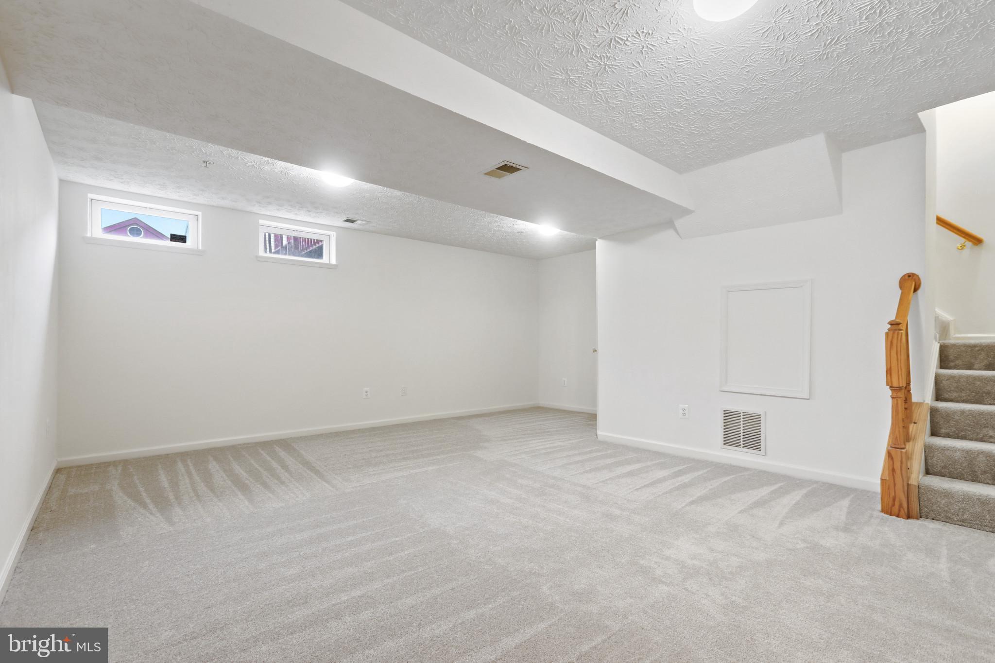 5209 Abbeywood Court Rosedale, MD 21237 - Photo 18 of 27 Lower Level recreation room