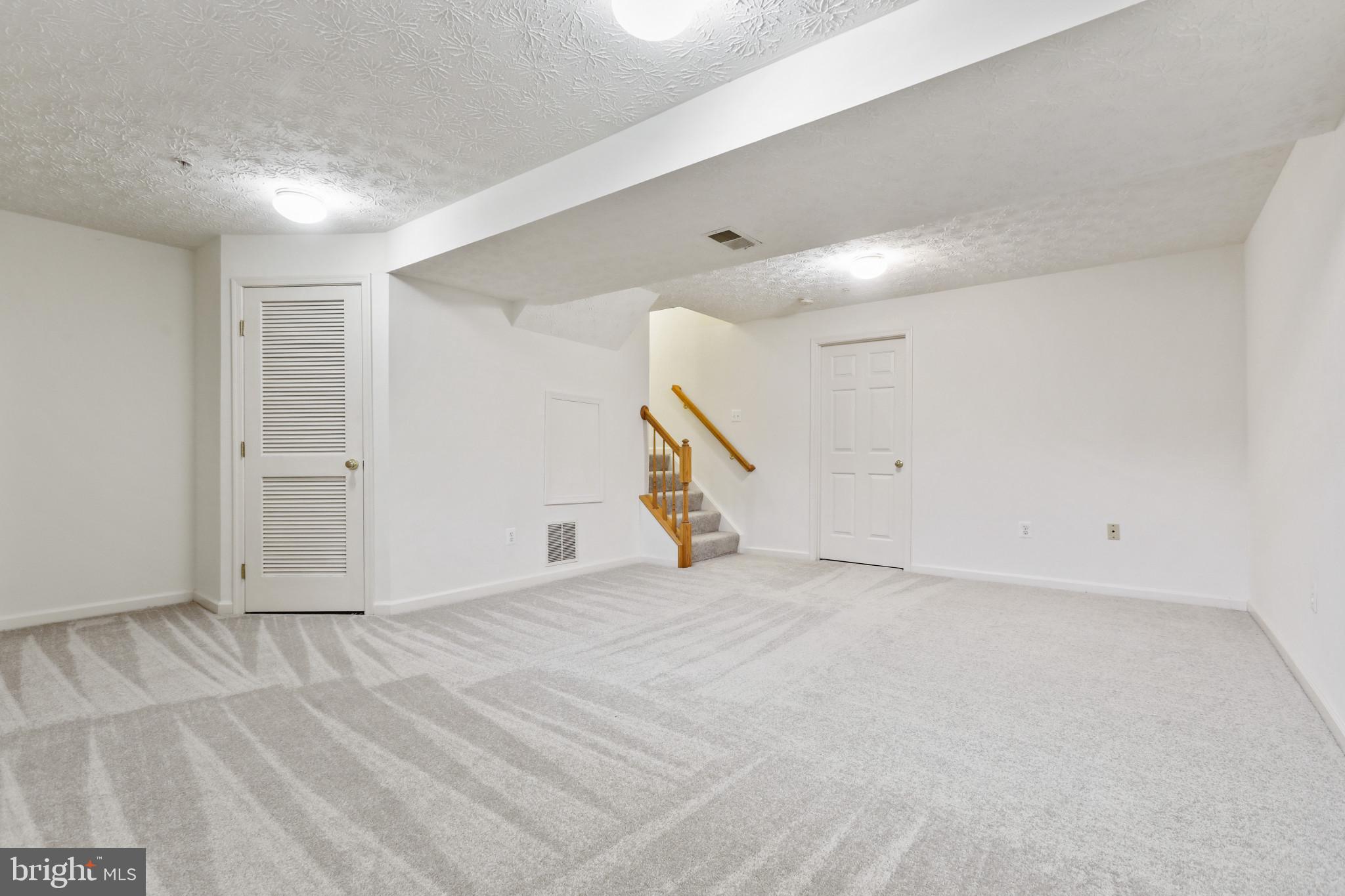 5209 Abbeywood Court Rosedale, MD 21237 - Photo 19 of 27 Lower level recreation room