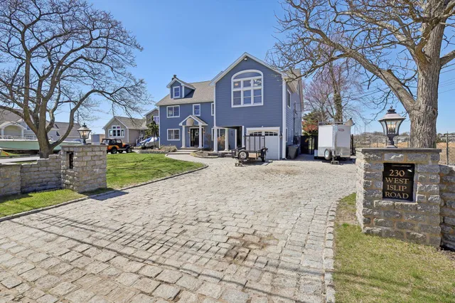 a view of a city with tall buildings and a yard