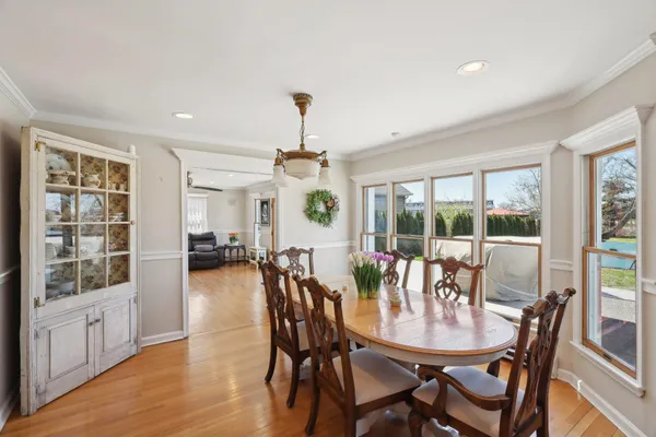 a view of a dining room with furniture window and outside view