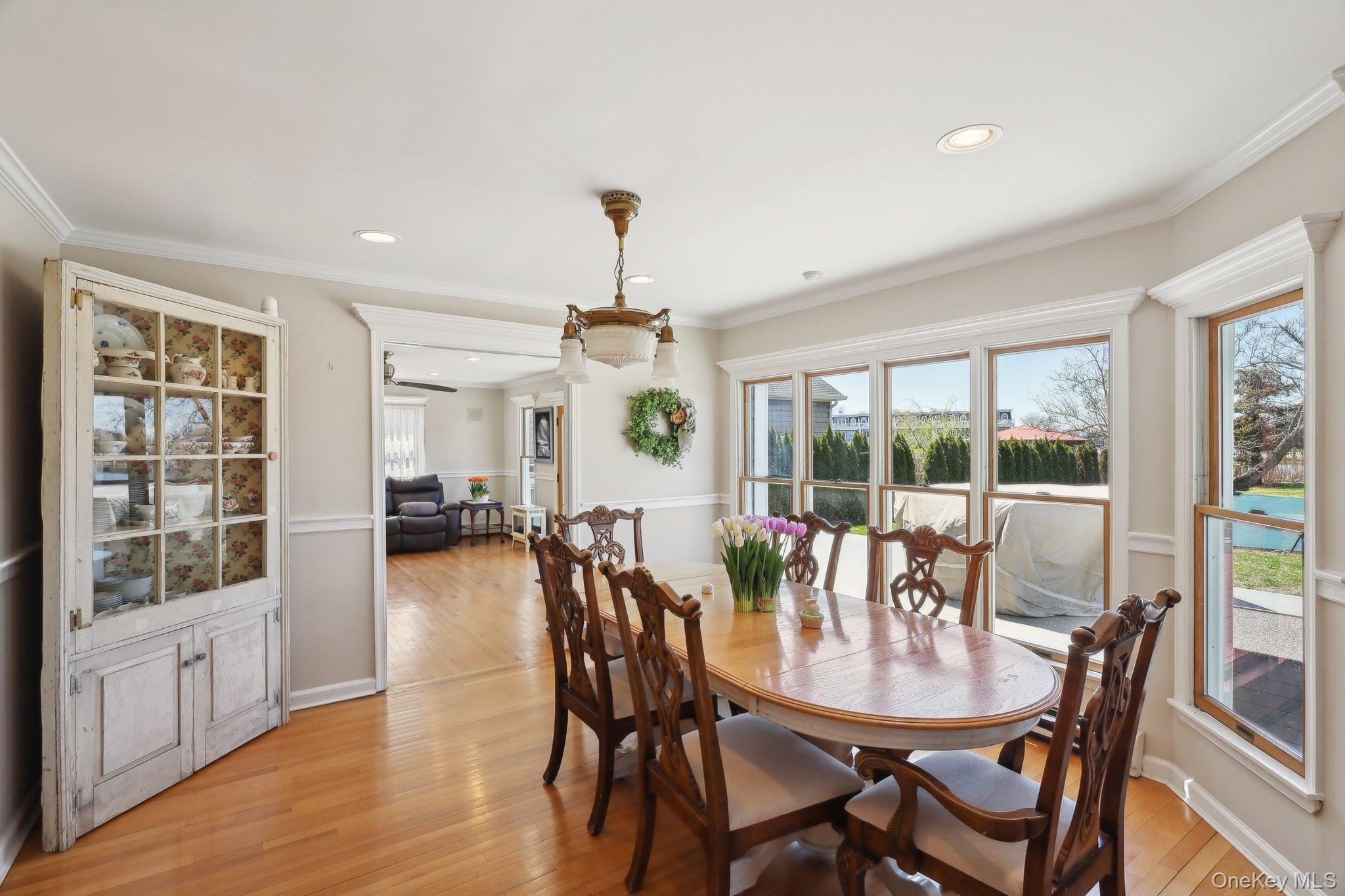 230 West Islip Road West Islip, NY 11795 - Photo 13 of 50 Dining room featuring crown molding, light wood-type flooring, and recessed lighting
