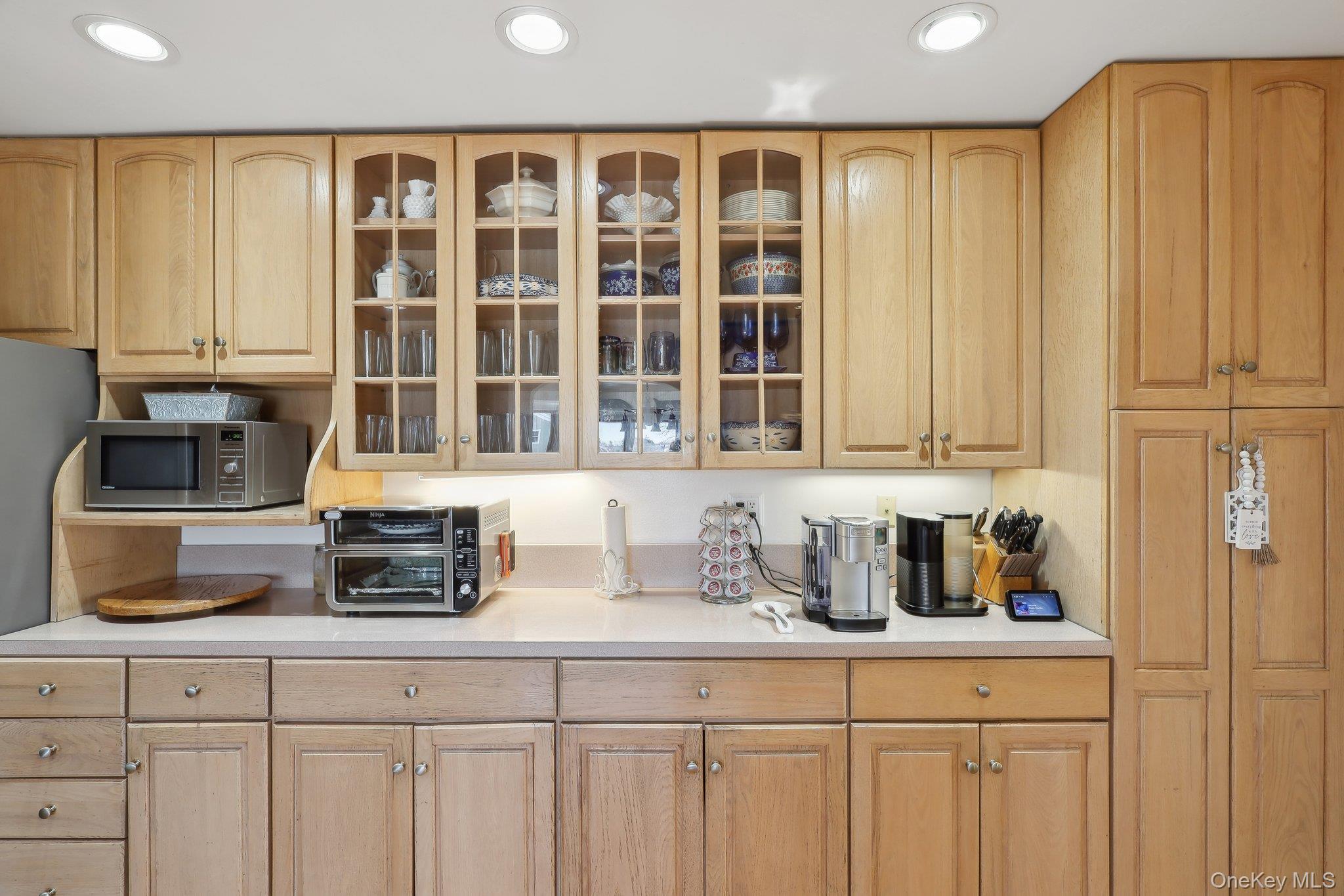 230 West Islip Road West Islip, NY 11795 - Photo 17 of 50 Kitchen with stainless steel microwave, recessed lighting, and light countertops