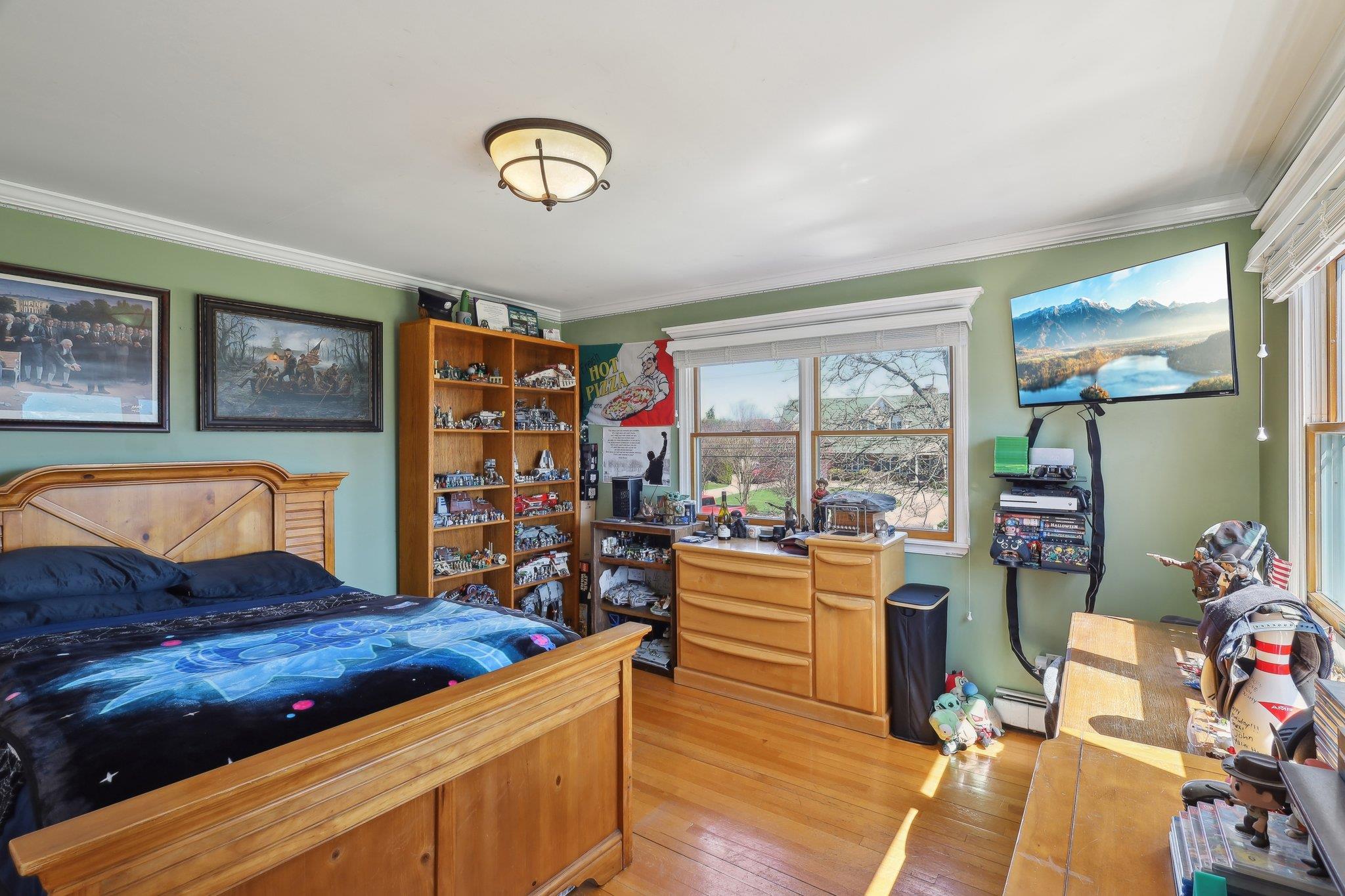 230 West Islip Road West Islip, NY 11795 - Photo 20 of 49 a living room with furniture and a flat screen tv