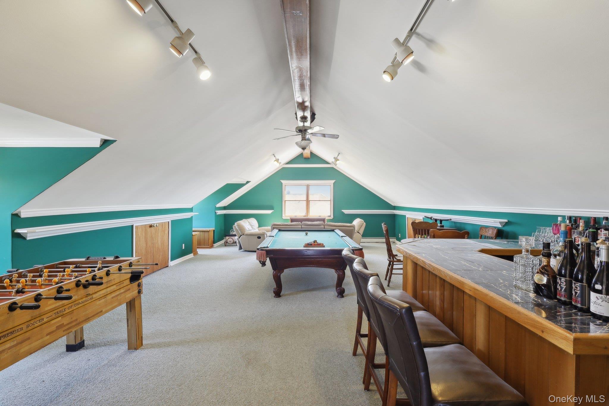 230 West Islip Road West Islip, NY 11795 - Photo 38 of 50 Game room featuring rail lighting, a ceiling fan, vaulted ceiling, carpet floors, and billiards