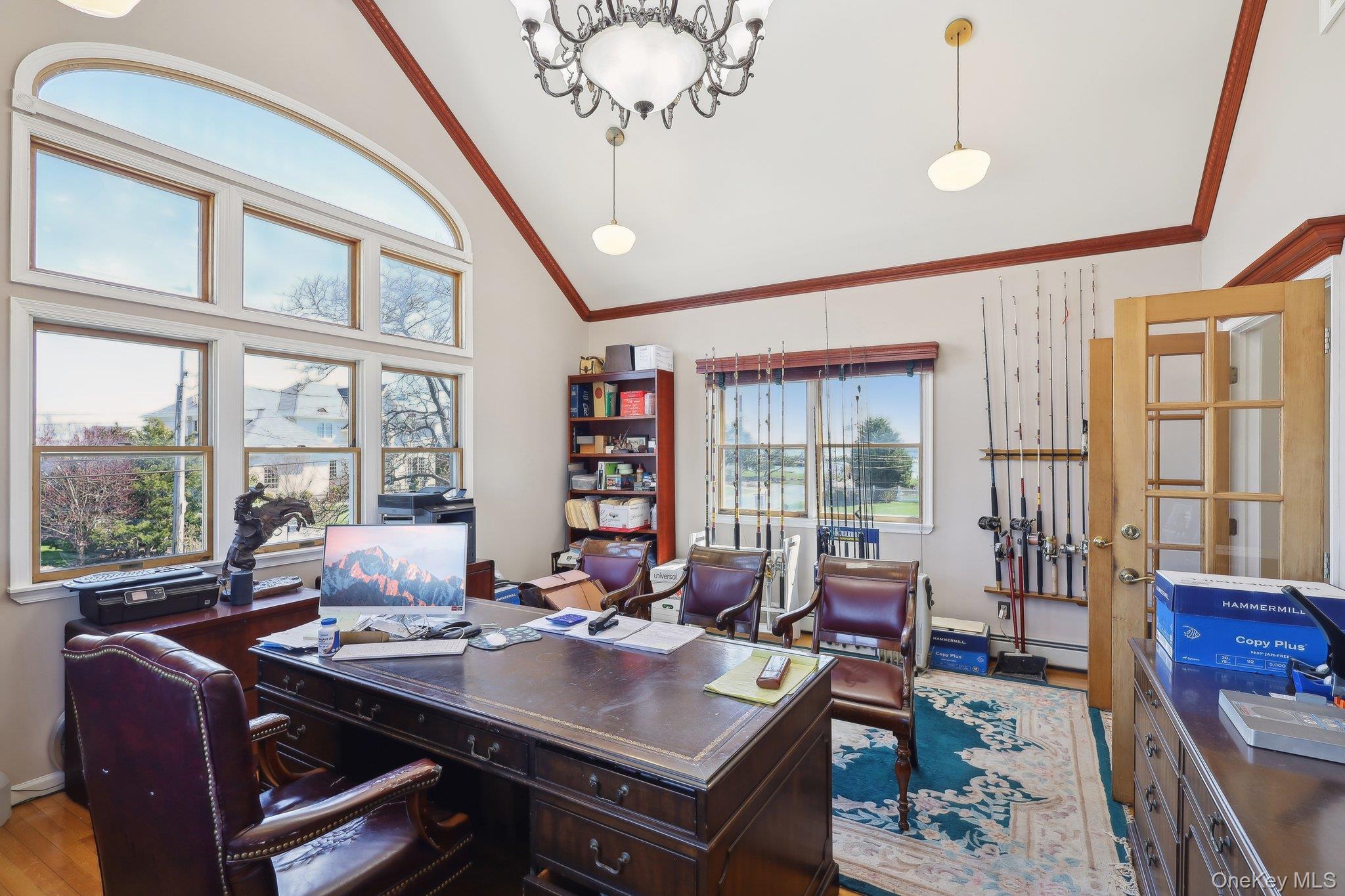 230 West Islip Road West Islip, NY 11795 - Photo 40 of 50 Office featuring crown molding, wood finished floors, high vaulted ceiling, and a baseboard radiator