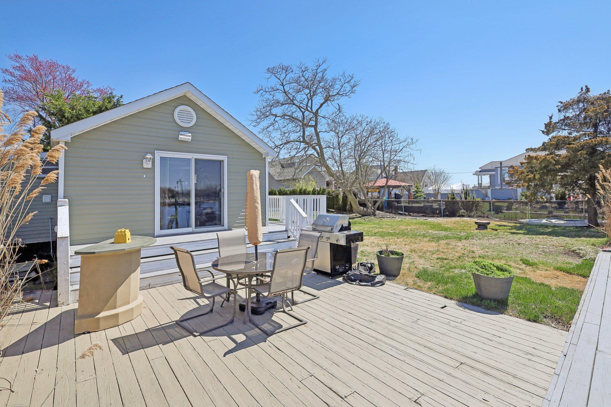 230 West Islip Road West Islip, NY 11795 - Photo 42 of 49 a view of a house with yard and sitting area