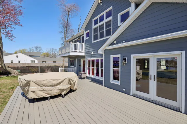a view of building with river in front of it