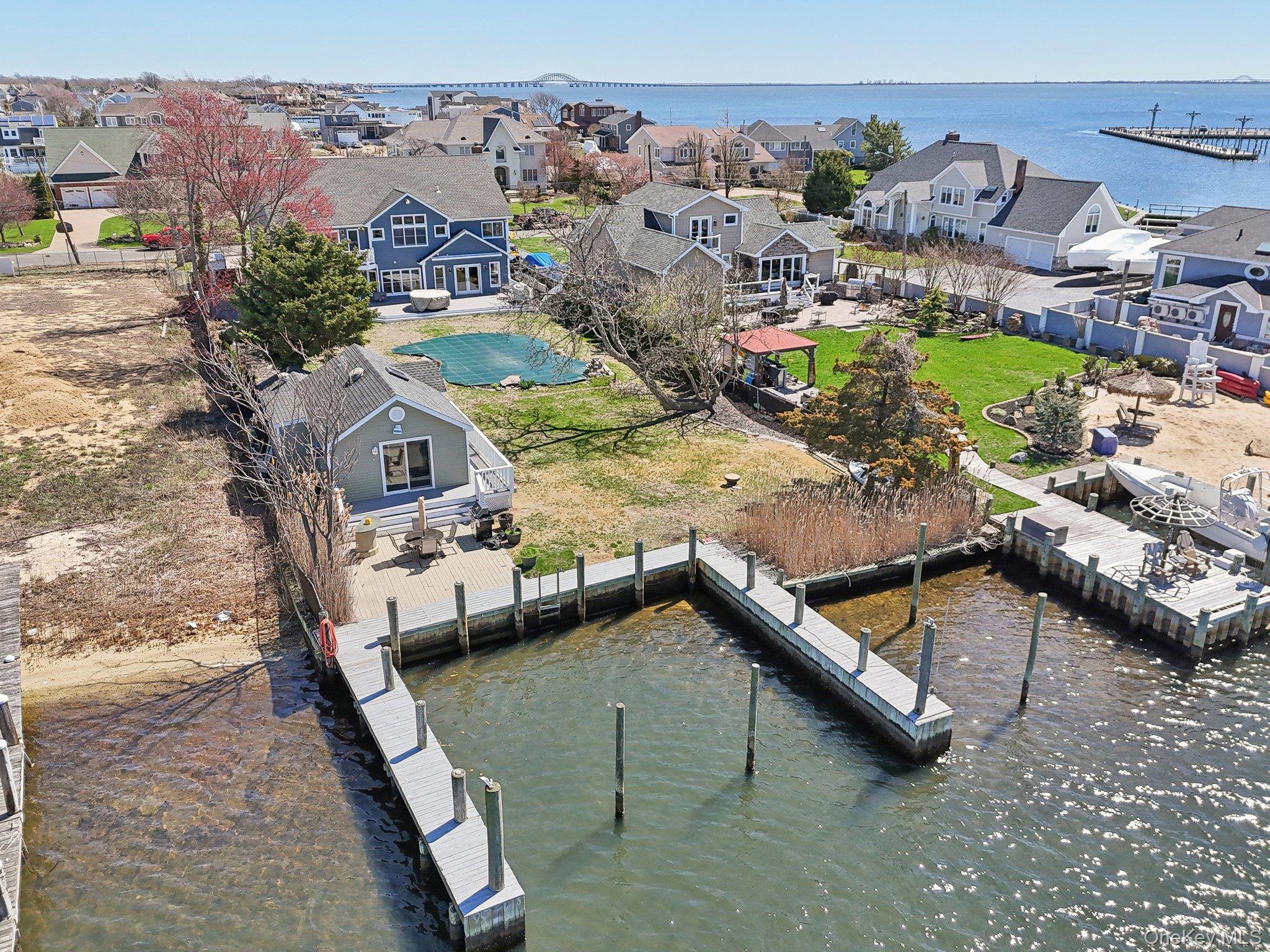 230 West Islip Road West Islip, NY 11795 - Photo 50 of 50 Dock area featuring a water view and a residential view