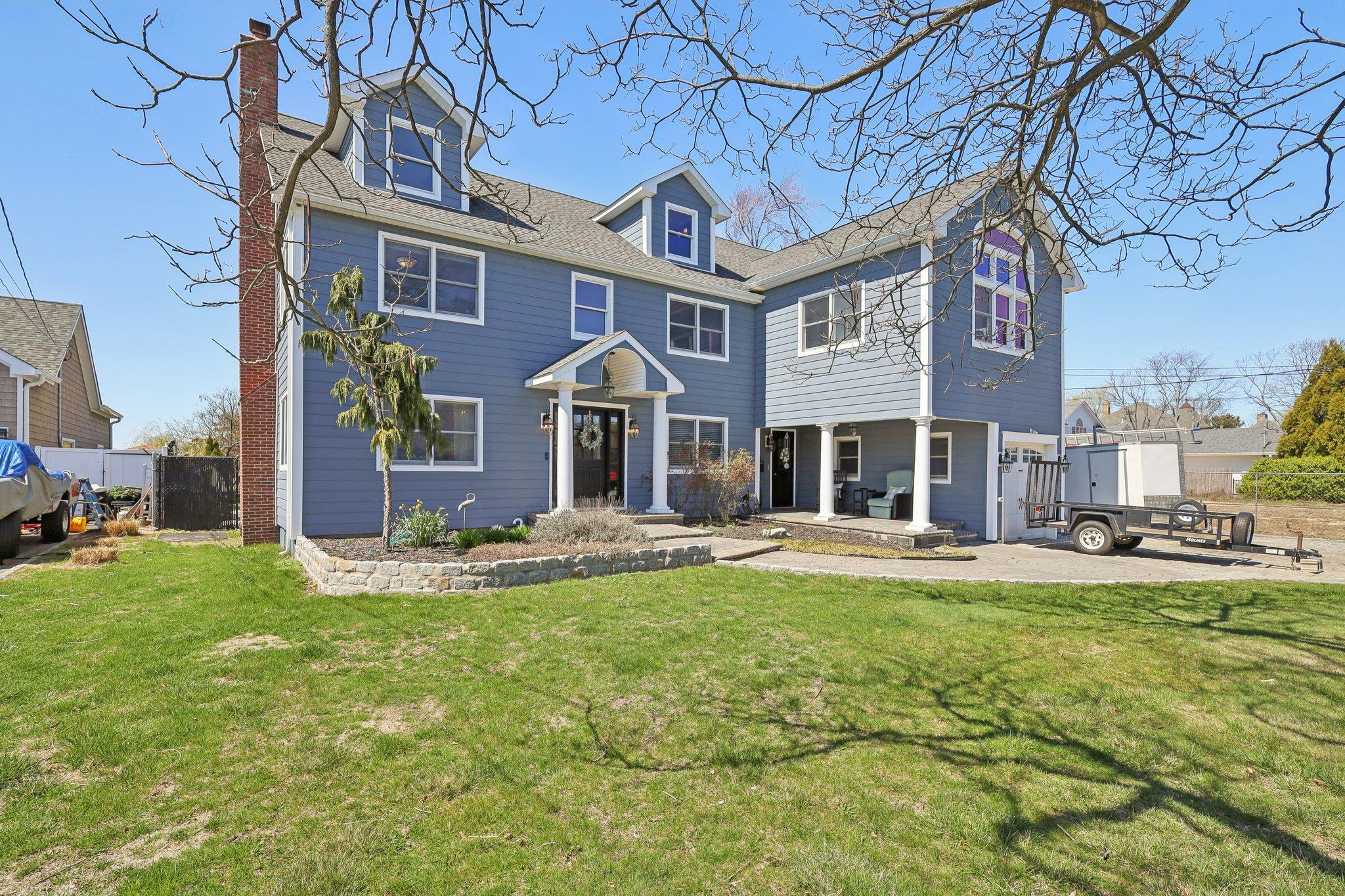 230 West Islip Road West Islip, NY 11795 - Photo 5 of 49 a view of a building with a yard