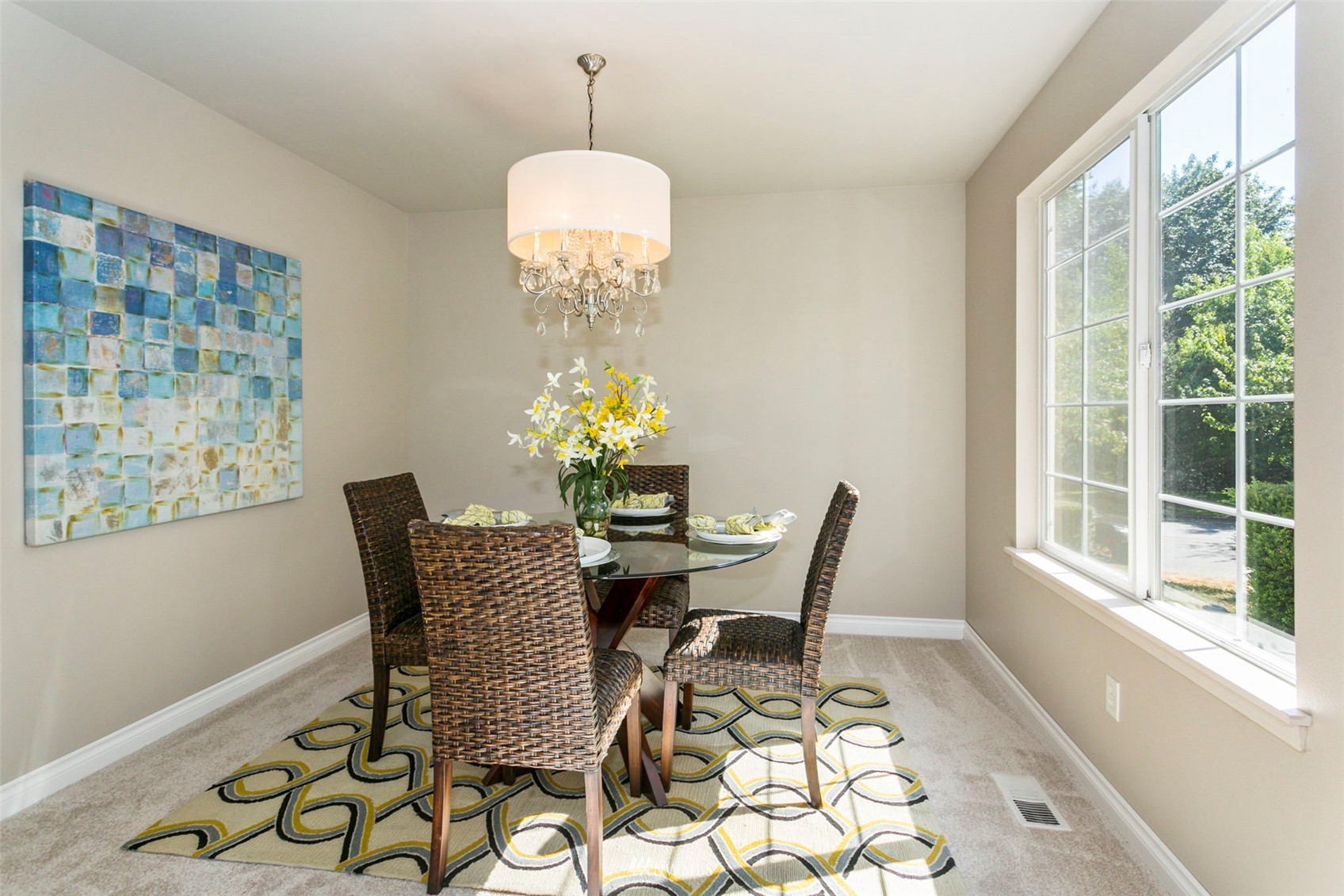 18487 Rainier View Road Southeast Monroe, WA 98272 - Photo 3 of 19 a view of a dining room with furniture a chandelier and wooden floor