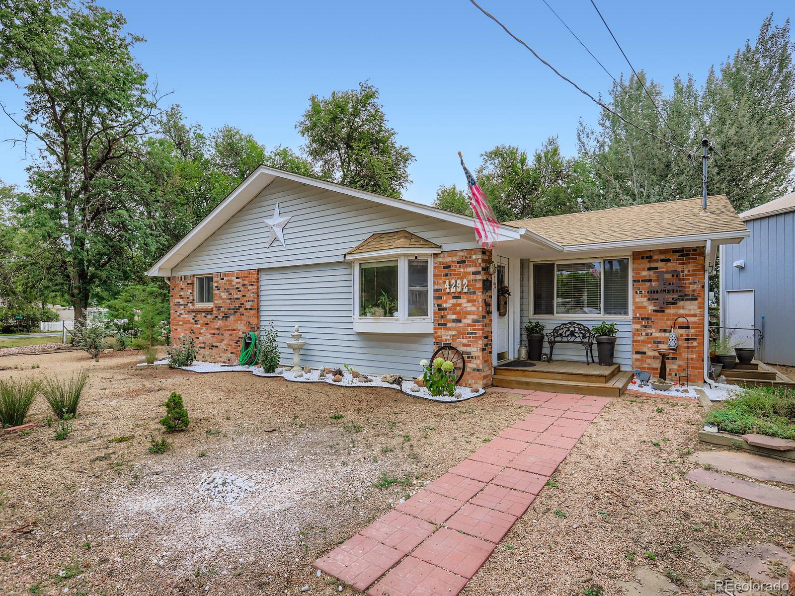 4292 North 119th Street Erie, CO 80516 - Photo 29 of 30 a front view of a house with a patio