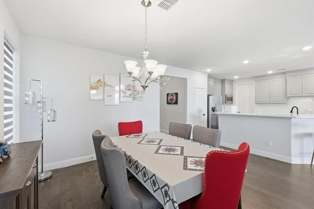 a view of a dining room with furniture