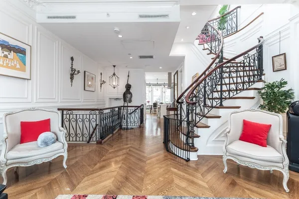 a view of entryway livingroom and hall