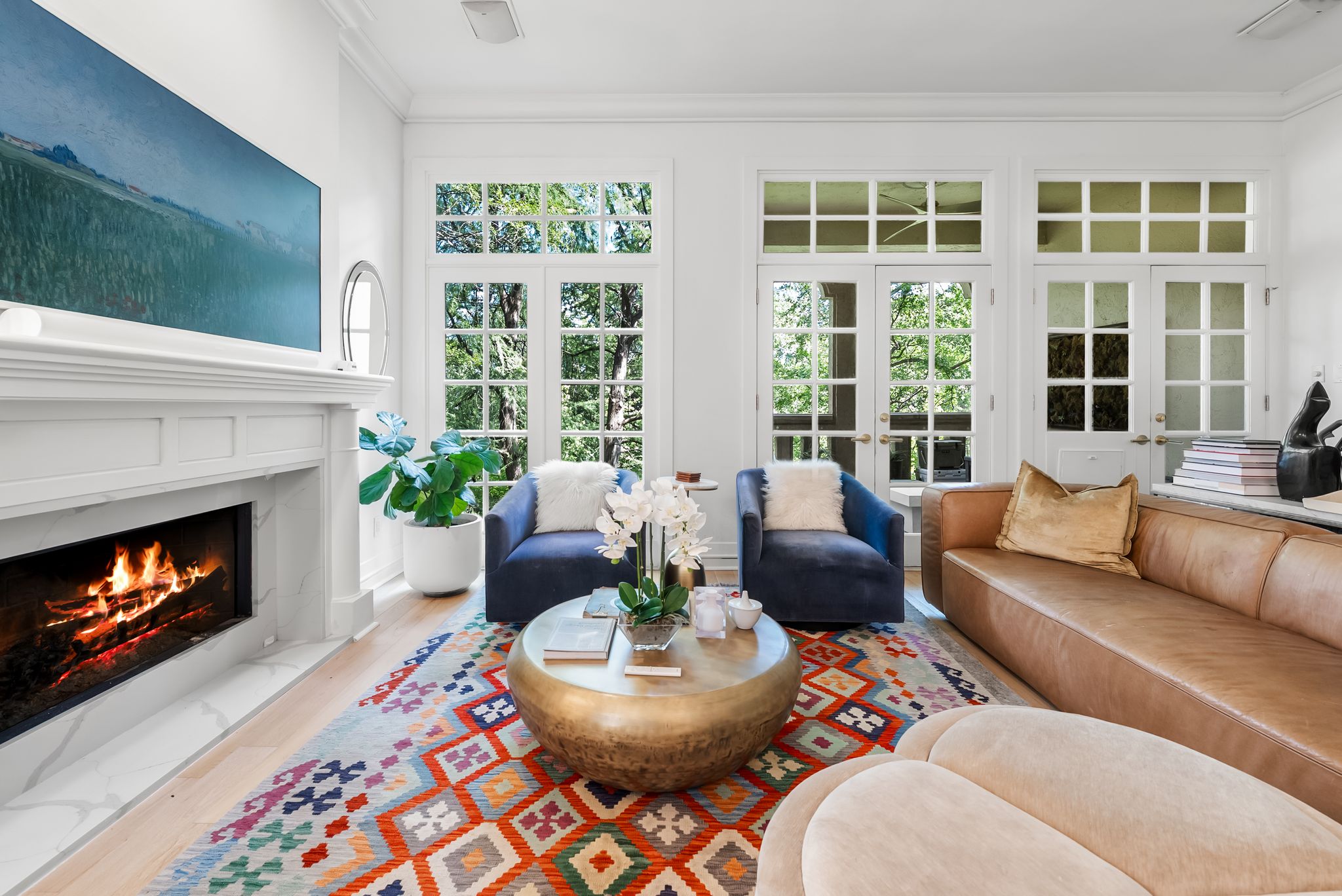 Sunroom / solarium with healthy amount of natural light and french doors