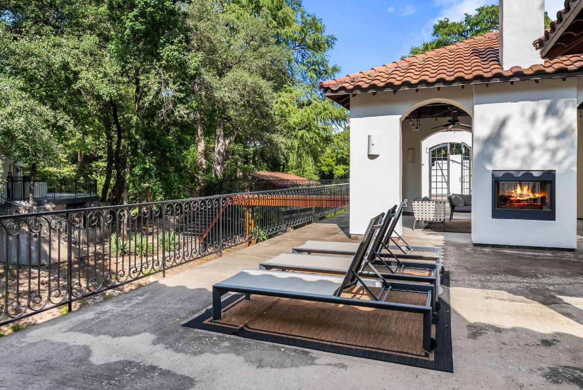 1937 Rue De St Tropez, Unit 10 Austin, TX 78746 - Photo 29 of 35 a view of outdoor space yard and patio