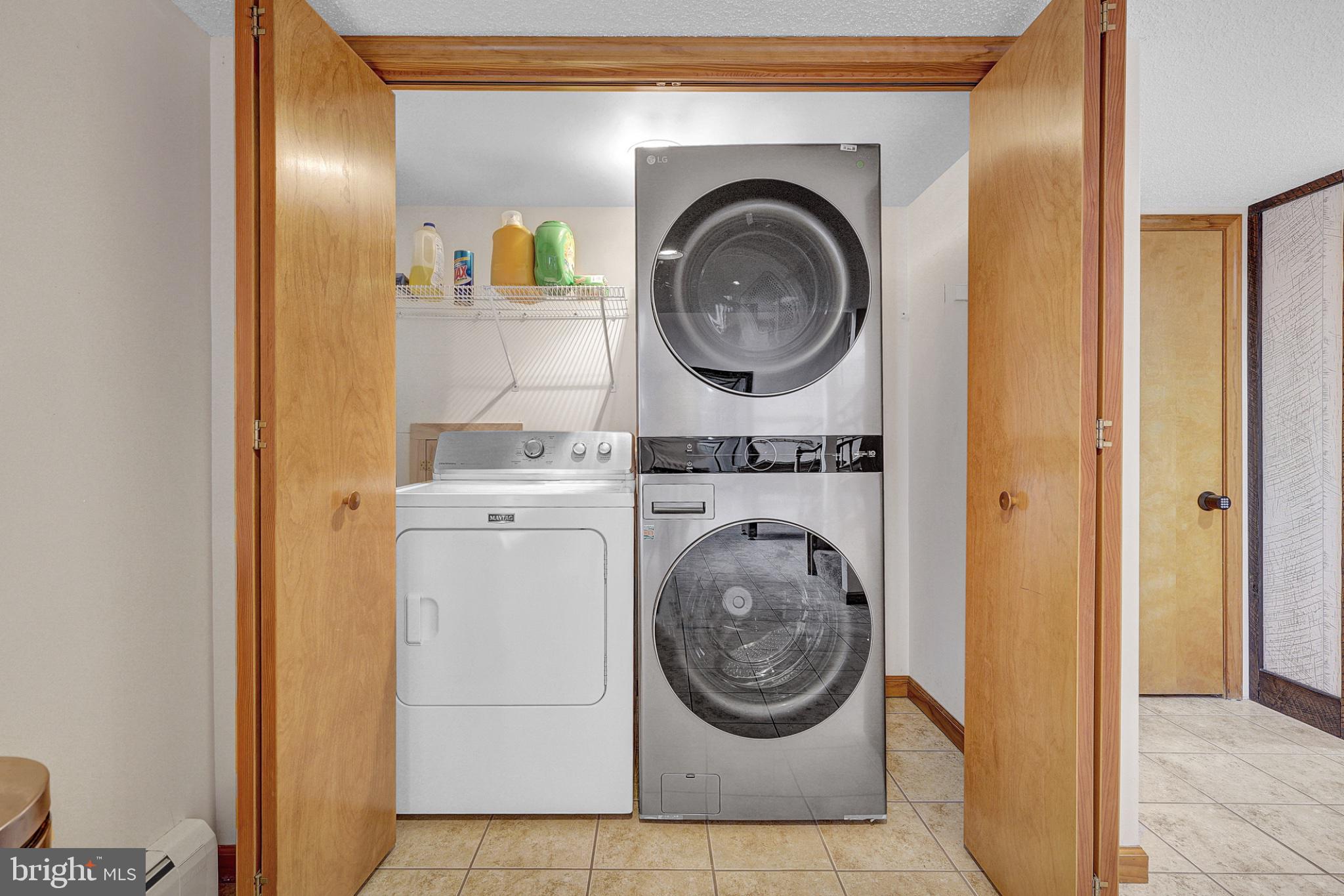 259 A A-Frame Road Coudersport, PA 16915 - Photo 53 of 130 Efficient laundry space with modern appliances.