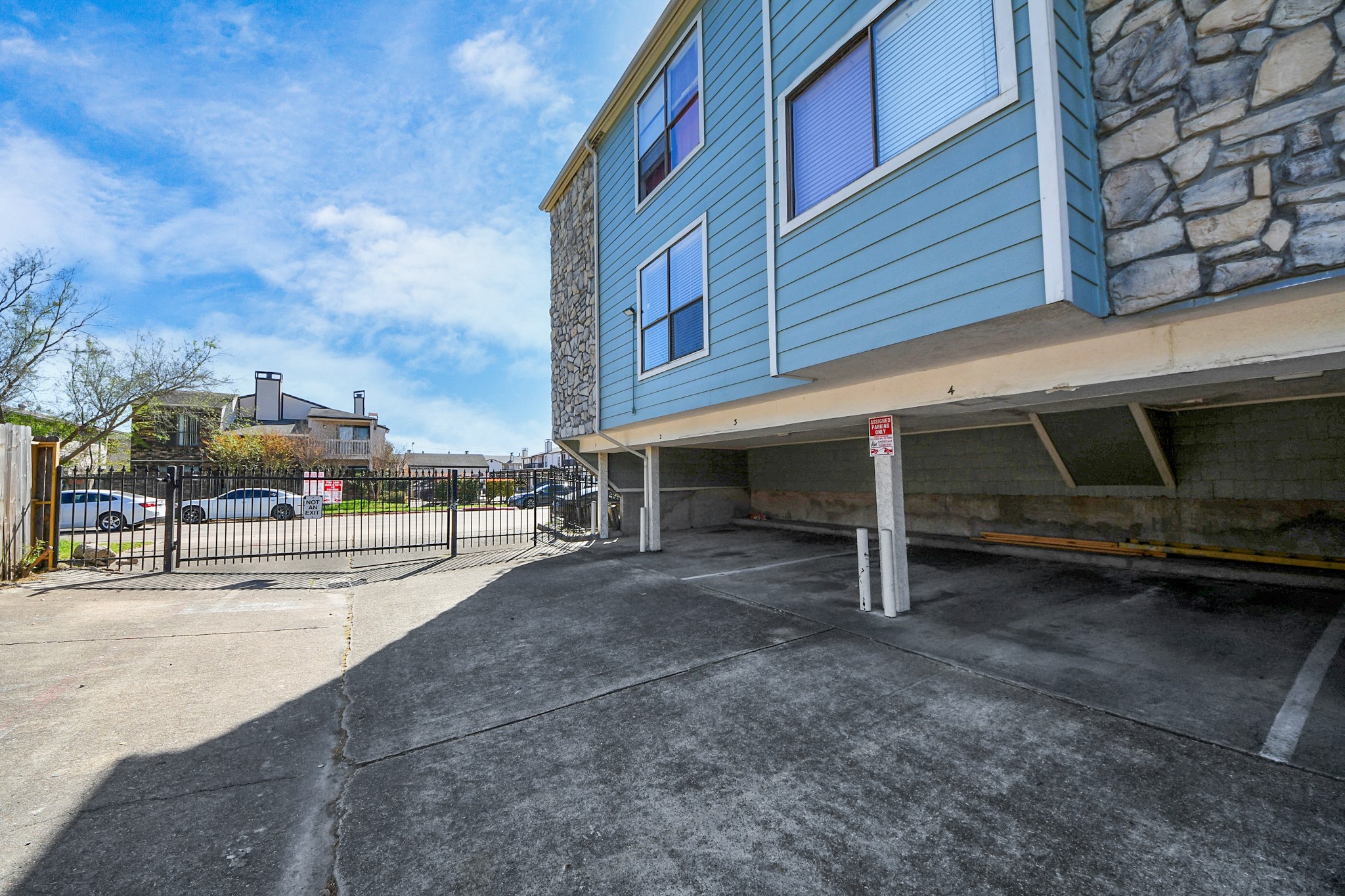 3750 Tanglewilde Street, Unit A7 Houston, TX 77063 - Photo 28 of 36 a view of a street with parking