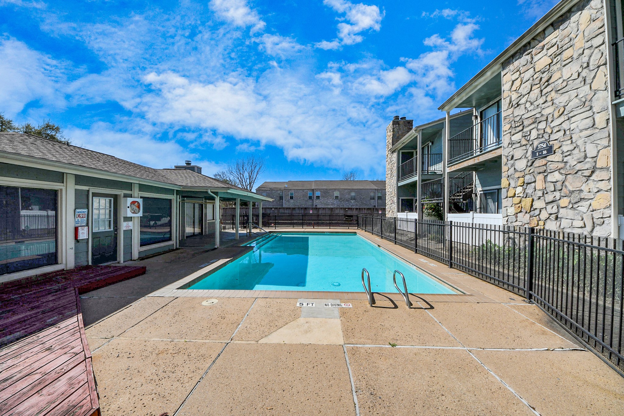 3750 Tanglewilde Street, Unit A7 Houston, TX 77063 - Photo 29 of 36 a view of a house with a backyard